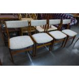 A set of four Danish Erik Buch teak dining chairs