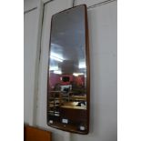 A teak framed mirror