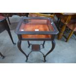 A Victorian Chippendale Revival carved mahogany bijouterie table