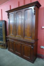 A Victorian mahogany six door housekeeper's cupboard
