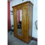 A Victorian satin birch wardrobe