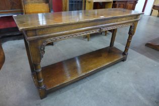 A 17th Century style carved Ipswich oak serving table