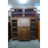 An Art Deco oak side by side bureau bookcase