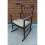 A Danish Sibast rosewood rocking chair, designed by Arne Vodder *Accompanied by CITES A10