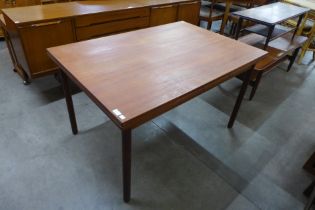 A Danish teak extending dining table