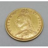 A Victorian 1890 half sovereign with shield back