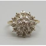 A 9ct gold and diamond ring, 2.1g, K