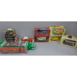 Nine die-cast model vehicles, boxed