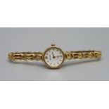 A lady's 9ct gold Accurist wristwatch, with box, total weight with movement 13.6g