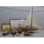 A mixed lot of nautical items, model boat, framed prints, telescope, model cannon, bosun's whistle
