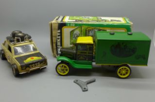 A John Deere Hawkeye clockwork truck, boxed and a Fiat Africa Safari 4x4 model vehicle