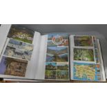 Two postcard albums containing approximately 600 modern postcards