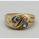 A 9ct gold ring set with blue and white stones, (lacking one small white stone), 3.5g, P