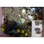 A collection of costume jewellery and beads