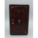 A Chubb miniature advertising money box in the form of a safe, with key, 11cm