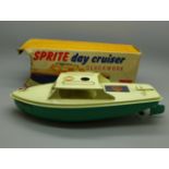 A Sutcliffe model tin-plate Sprite Day Cruiser with key, boxed