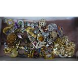 Approximately 70 costume brooches