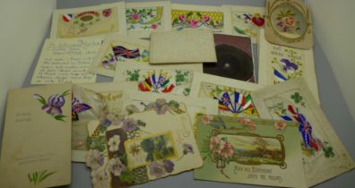A collection of early 20th Century postcards including one Tuck's Gramophone Record Postcard