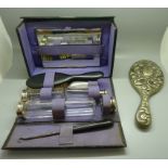 A gentleman's travel set, boxed and a hand mirror