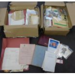 Two boxes of ephemera including postcards, pictures, documents, letters, etc.