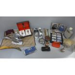 Assorted items including a Squirrel shaped nutcracker, spirit flasks, Cunard matches, travel