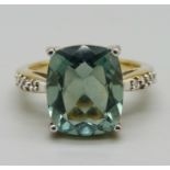 A silver gilt, fluorite set ring with diamond accents, N