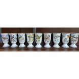 A set of nine Franklin Porcelaine 'Song Birds' Oiseaux Chanteurs de L'Europe goblets