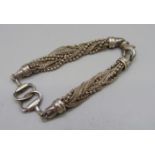 A white metal bracelet