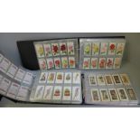 Three albums of cigarette cards