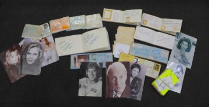 A collection of autograph books including signatures by Sid James, Eric Morecambe, Ted Rodgers,