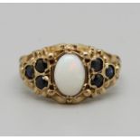 A 9ct gold sapphire and opal ring, 3.6g, L