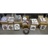 A large collection of commemorative plates including Wedgwood, Royal Doulton, Bradford Exchange