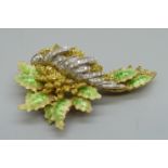 An 18ct gold, diamond and enamel spray brooch, made in Italy in the 1960's, set with twenty-four