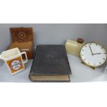 A Holy Bible, a Junghans clock, a hot water bottle, costume jewellery, etc.