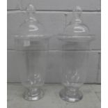 Two large glass lidded vases, one slight chip to inner lid