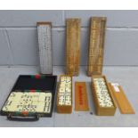 Three cribbage boards, including one marked HMS Warspite, and three sets of dominoes