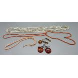 Two pairs of amber earrings, a pearl necklace, a silver pendant and three coral necklaces