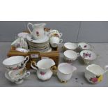 A collection of floral design china including tea cups and saucers, makers include Stanley and