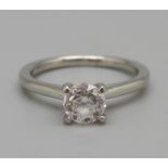 A platinum set round brilliant cut diamond ring, 0.80 carat diamond weight, colour D, clarity SI2,