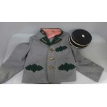 A WWII German Hitler Youth jacket and cap, (fit 4-6 yrs approximate)
