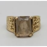 A 9ct gold ring set with smoky quartz, 4.2g, M