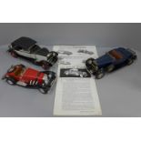 Three models of vintage cars, one a/f, with two sets of paperwork