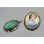 A Limoges brooch and a white metal stone set pendant