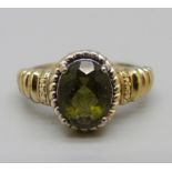 A silver gilt, Modavite solitaire ring, with certificate, L