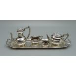 A hallmarked silver miniature tea service and tray, Birmingham 1970, tray 14.5cm