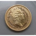 A 1987 gold coin, stamped Angel, 1/10th ounce fine gold, 3.2g