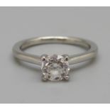 A platinum set round brilliant cut diamond ring, 0.80 carat diamond weight, colour D, clarity SI2,