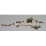 Two 9ct gold brooches including one depicting a ship, three other brooches and a stick pin, (two