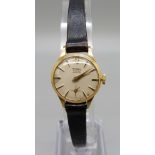 A lady's Technos 18ct gold cased wristwatch