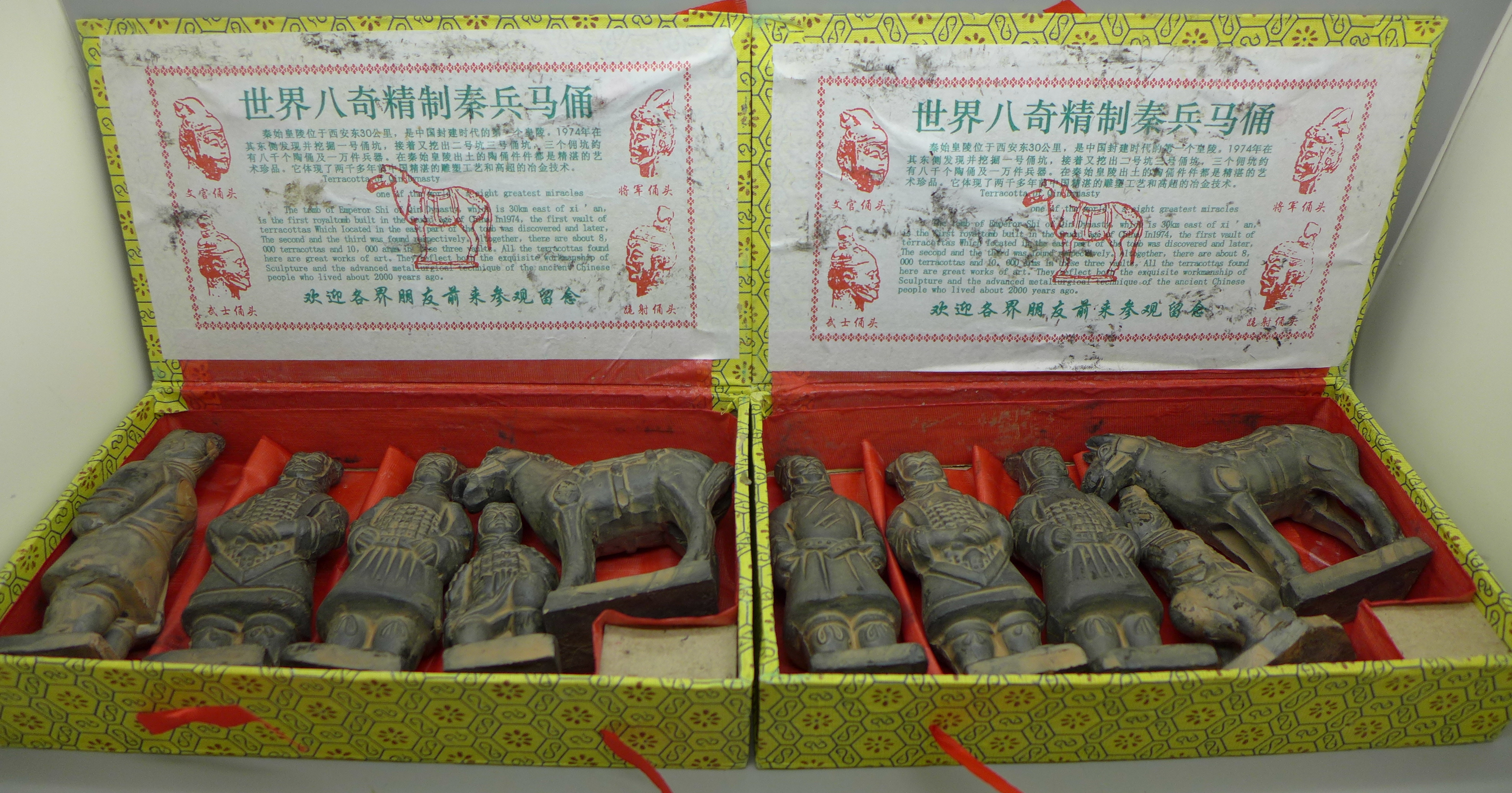 Two boxes of terracotta warrior figures based on the Royal Tombs discovered in 1974